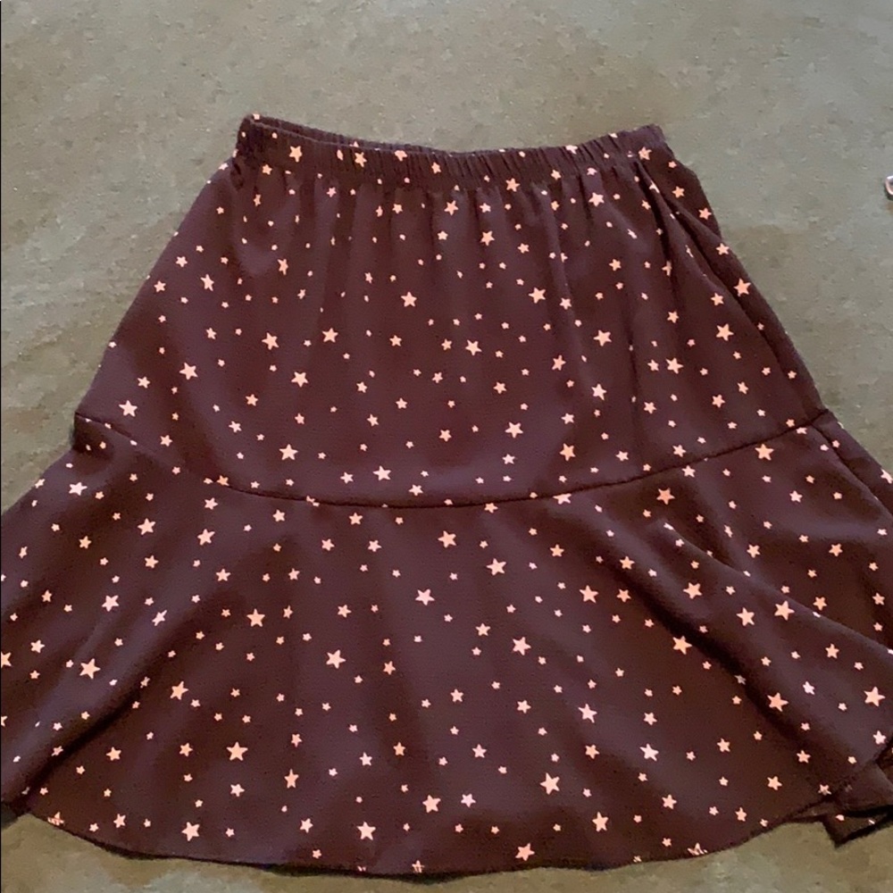 Black star mini skirt